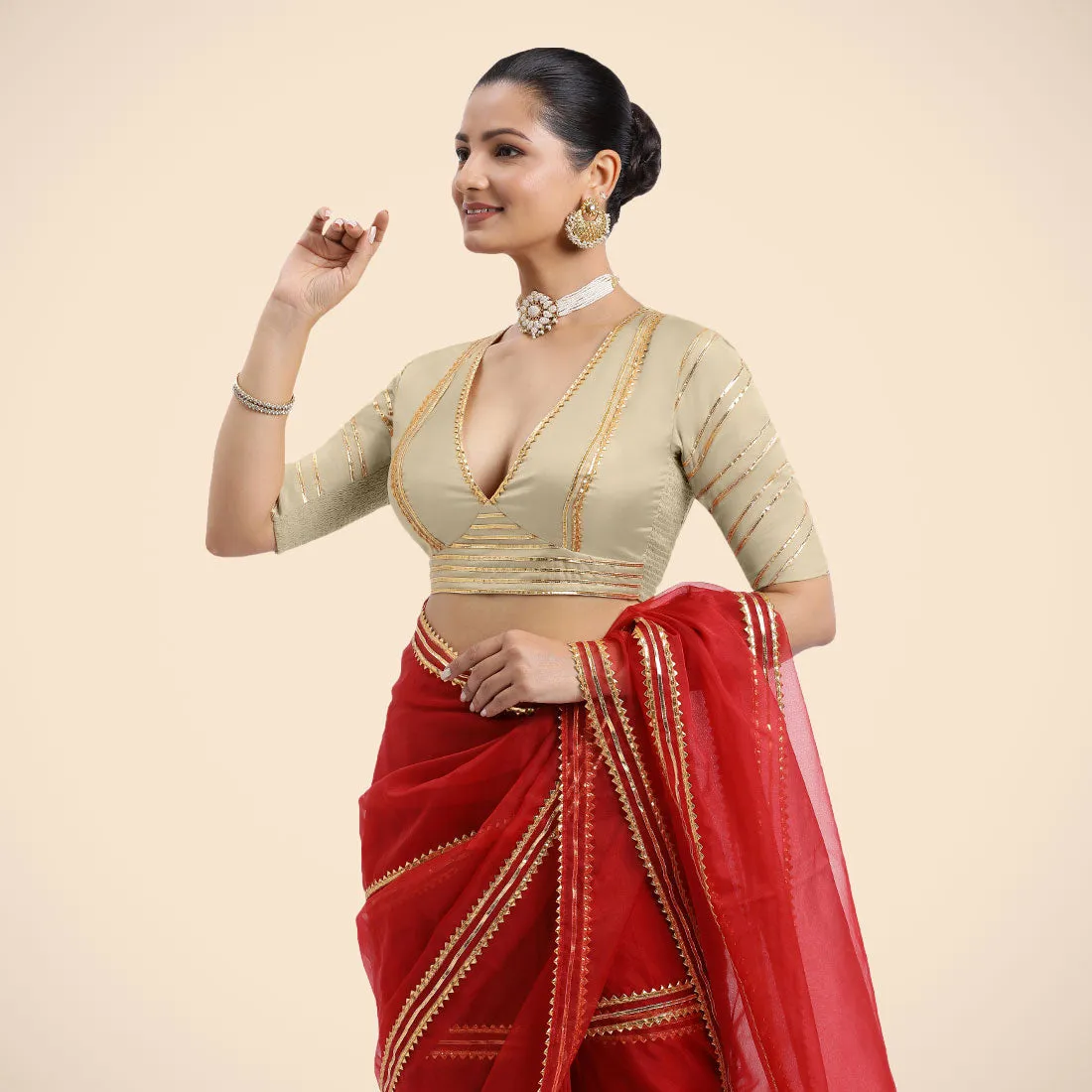 Navya x Tyohaar | Cream Elbow Sleeves FlexiFit™ Saree Blouse with Plunging V Neckline with Tasteful Golden Gota Lace