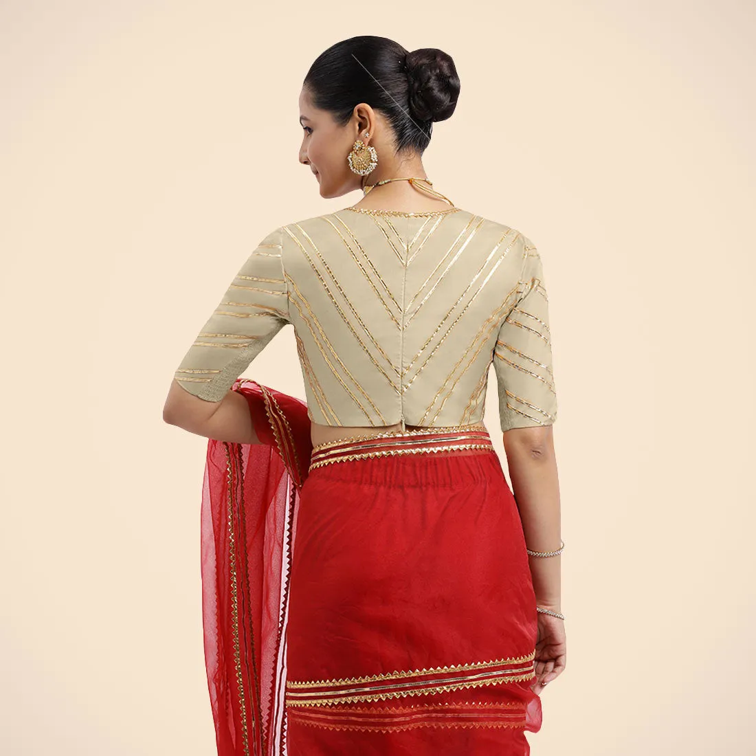 Navya x Tyohaar | Cream Elbow Sleeves FlexiFit™ Saree Blouse with Plunging V Neckline with Tasteful Golden Gota Lace